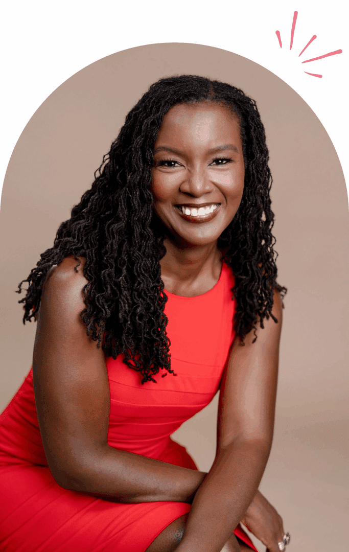 Smiling woman in red dress, sitting pose.